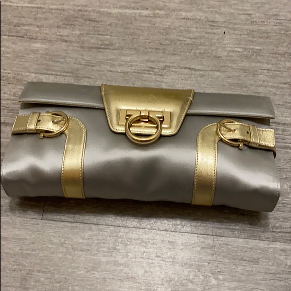 Salvatore Ferragamo Handbags - Salvatore Ferragamo silver and gold leather clutch. GREAT MOTHERS DAY GIFT! 💝